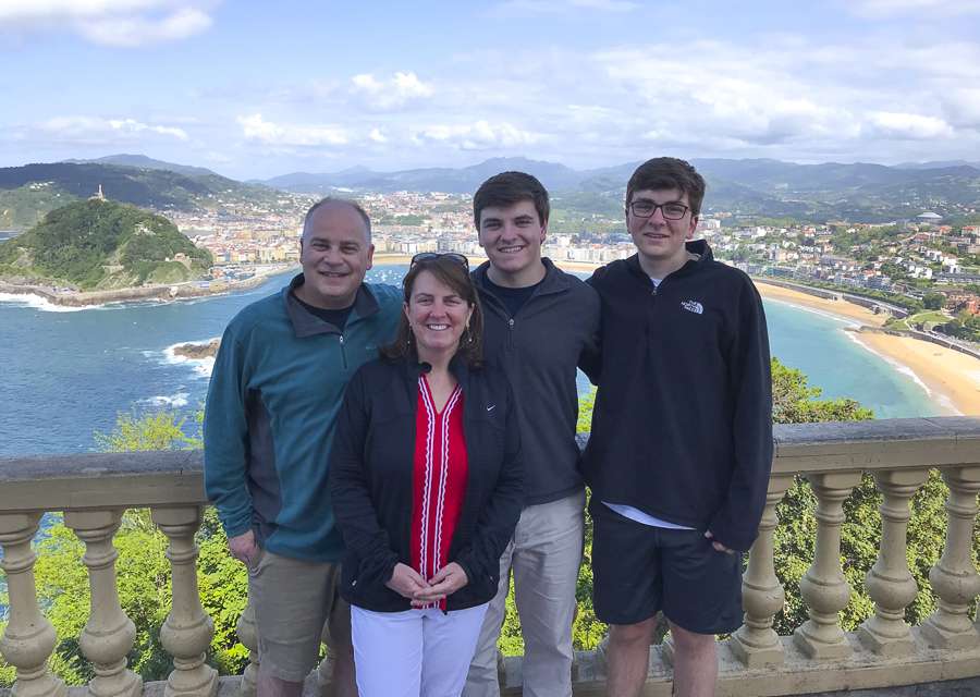 san-sebastian-beach-spain Brent, Missy, and sons standing on overlook of Bay of Biscay beach at San Sebastián, Spain